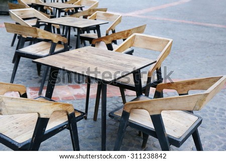 Wood Table Europe Cafe Outdoor Tables And Black Chairs Set Up For Wood Table Europe Cafe Outdoor Tables And Black Chairs Set Up For