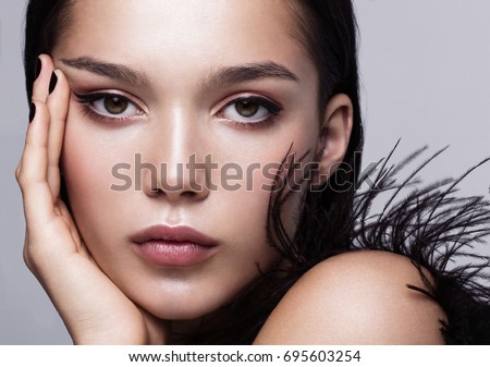 Image, Stock Photo Close up smoky portrait of young dark haired woman with curls, light blue eyes and freckles