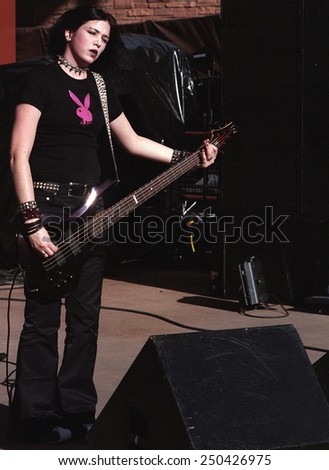 DENVER	MAY 01:		Bassist Talena Atfield of the Alternative Rock band Kittie performs in concert May 11, 2001 at Red Rocks Amphitheater in Denver, CO.