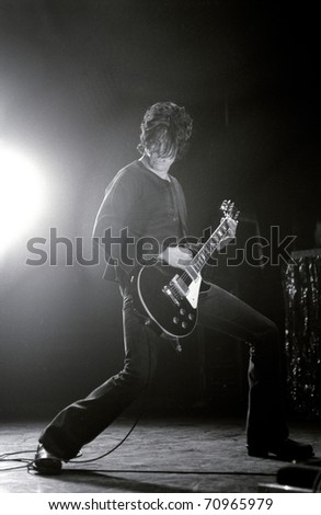 DENVER - NOVEMBER 2: Dean DeLeo Guitarist of the alternative rock band Stone Temple Pilots performs in concert November 2, 2000 at the Magnus Arena in Denver, CO.