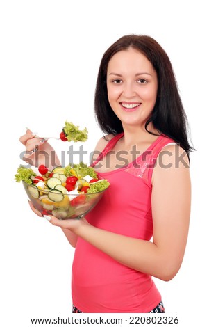 happy teenage girl eat salad