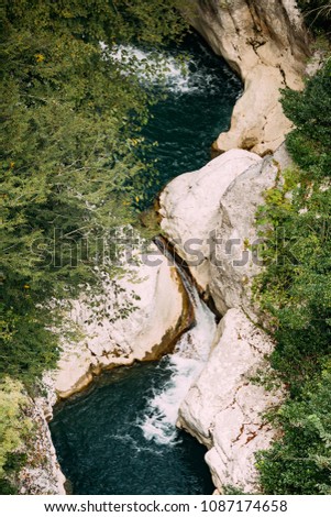 Similar – Image, Stock Photo Zeda-gordi, Georgia. View Of Paved Forest Path Leading To Canyon Okatse In Sunset Or Sunrise Time. Sun Sunshine With Natural Sunlight And Sun Rays Through Woods Trees. Beautiful Scenic View