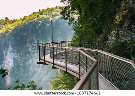 Image, Stock Photo Zeda-gordi, Georgia. View Of Paved Forest Path Leading To Canyon Okatse In Sunset Or Sunrise Time. Sun Sunshine With Natural Sunlight And Sun Rays Through Woods Trees. Beautiful Scenic View