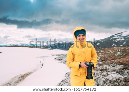 Similar – Foto Bild Aurlandsfjellet, Norwegen. Happy Young Woman Tourist Traveler Photographer With Camera Walking Near Aurlandsfjellet Scenic Route Road. Aktiver Lebensstil in der norwegischen Natur