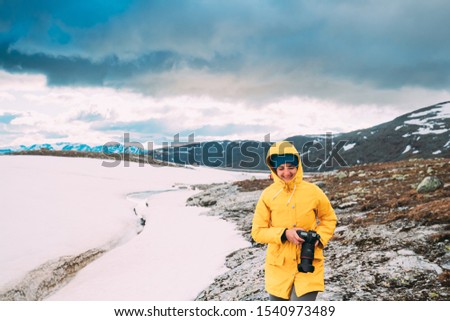 Similar – Foto Bild Aurlandsfjellet, Norwegen. Happy Young Woman Tourist Traveler Photographer With Camera Walking Near Aurlandsfjellet Scenic Route Road. Aktiver Lebensstil in der norwegischen Natur