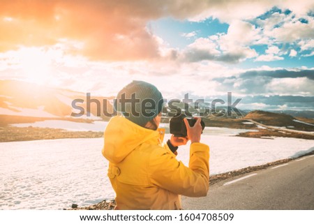 Similar – Foto Bild Aurlandsfjellet, Norwegen. Happy Young Woman Tourist Traveler Photographer With Camera Walking Near Aurlandsfjellet Scenic Route Road. Aktiver Lebensstil in der norwegischen Natur