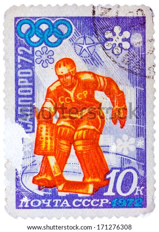 USSR - CIRCA 1972: Stamp printed in USSR (Russia) shows Olympic Rings and Ice Hockey with the inscription \