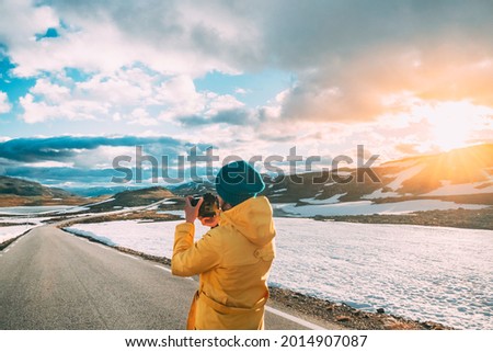 Similar – Foto Bild Aurlandsfjellet, Norwegen. Happy Young Woman Tourist Traveler Photographer With Camera Walking Near Aurlandsfjellet Scenic Route Road. Aktiver Lebensstil in der norwegischen Natur