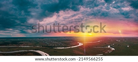 Similar – Image, Stock Photo High view of a mosaic landscape on a cloudy day. Spain fields scenery. Beautiful sunset with yellow colors