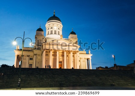 Famous landmark in Finnish capital: Senate Square with Lutheran cathedral and monument to Russian emperor Alexander II at summer night