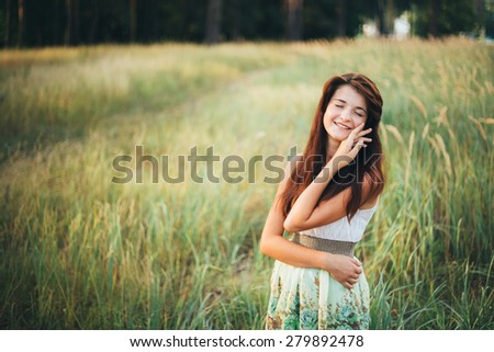 Close Up Portrait Of Young Happy Beauty Red Hair Girl In Nature In Summer Park