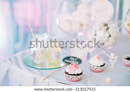 Dessert Sweet Cupcakes, Candy, confection On Table. Sweets. Candy bar. Sweet holiday buffet.