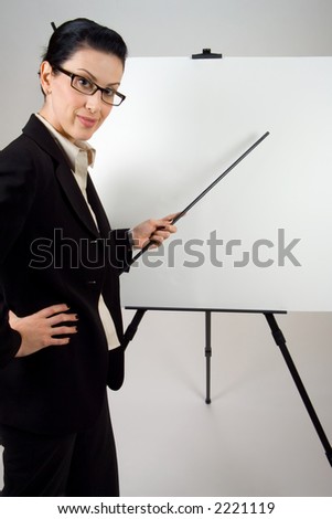 Female presenter with blank presentation whiteboard