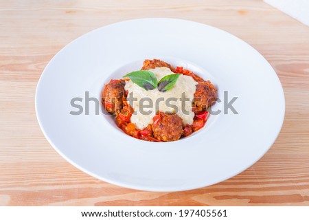 Spaghetti meat ball with red and white sauce in fusion style.