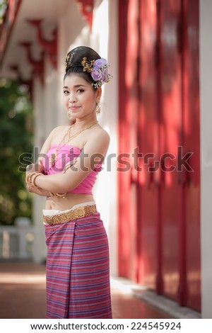 Asian woman wearing old-fashion lanna style cloth.