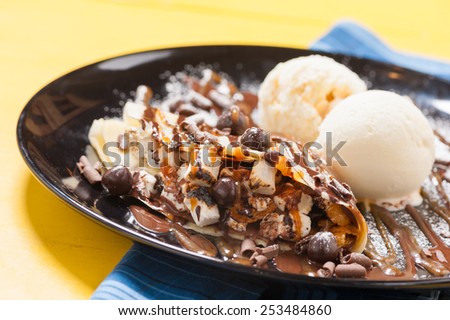 crepe with chocolate, marshmallow, and ice cream