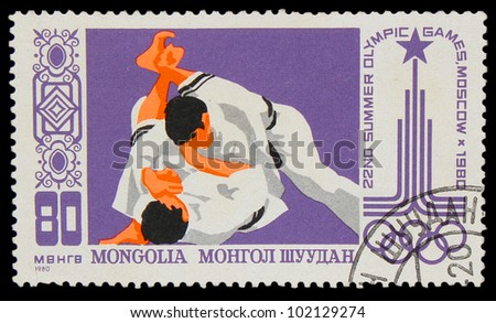 MONGOLIA - CIRCA 1980: A stamp printed in MONGOLIA, Olympic games Moscow 1980, judo,two athletes fight, circa 1980