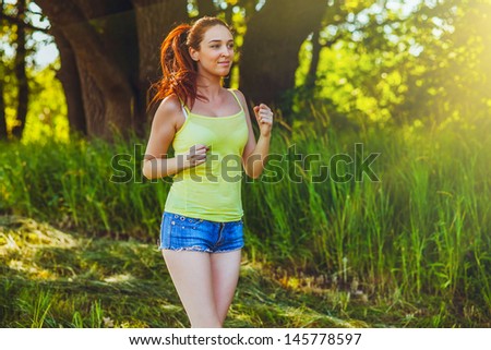 sunlight brunette woman young runner running outdoors, prospect lifestyle healthy, fitness sports