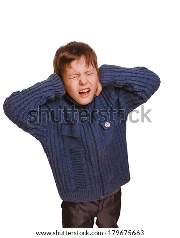 teenager child boy  covered his ears screaming opened his mouth and closed eyes isolated on white background