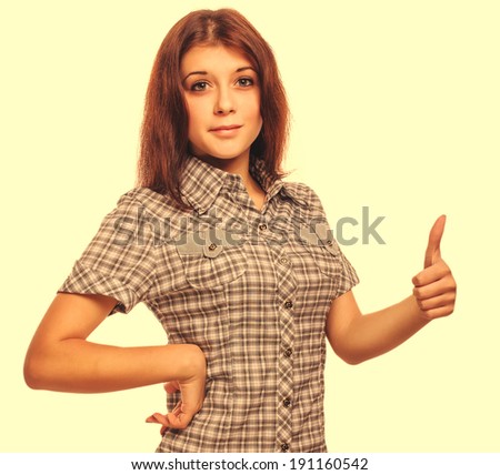 woman young girl shows positive sign thumbs yes, shirt shorts isolated large cross processing retro