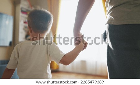 Similar – Image, Stock Photo Close up toddler hand on the table