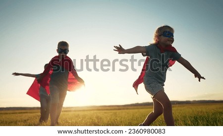 Similar – Image, Stock Photo Little superhero with flying cape