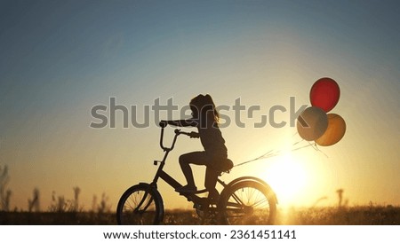 Similar – Image, Stock Photo Man cycling on sandy beach hill