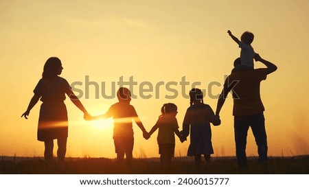 Similar – Image, Stock Photo Four children on a meadow at sunset