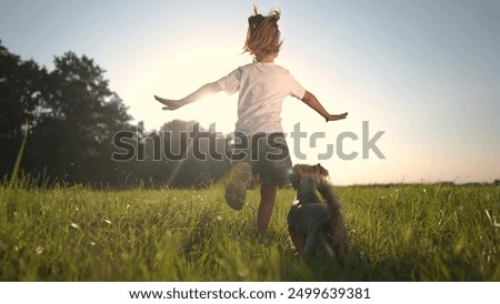 Image, Stock Photo Little girl playing in the fields