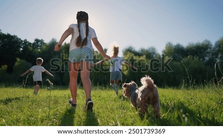 Similar – Image, Stock Photo Child with two dogs Pet