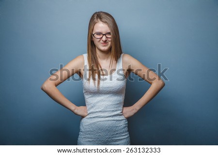 Woman with glasses in a white dress, hands on hips, angry