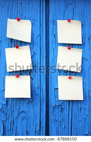 Reminder notes, blue wood background with space for your message
