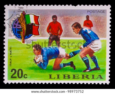 LIBERIA - CIRCA 1974: A post stamp printed LIBERIA, Italy vs. Haiti soccer World Cup in Munich, Germany, Germany , circa 1974