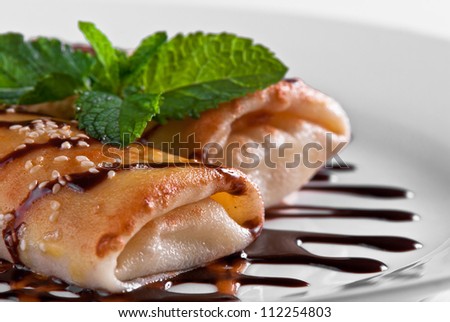 pancake rolls with chocolate caramel topping