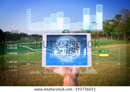 Touch pad and graph data information : Elements of this image furnished by NASA