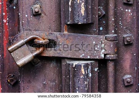 Door unlocked with padlock