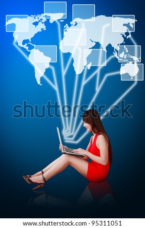 Woman in red dress using notebook computer and connect to world map