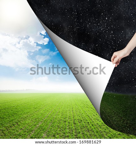 hand changing reality. Nature background. weather changing