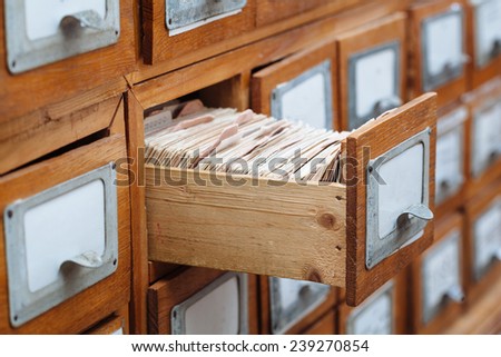 A file cabinet drawer full of files