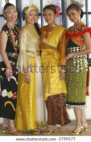 A multi ethnic races in Malaysia wearing traditional costumes