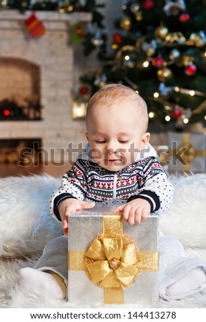 Little boy with the packaged gift