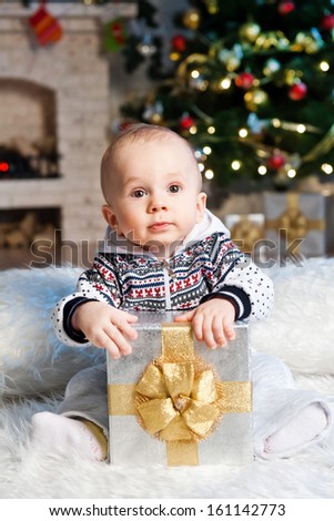 Little boy with the packaged gift