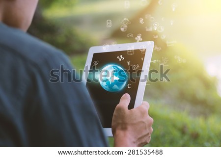 Globalization business concept.Businessman using digital tablet.
