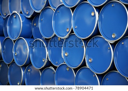 Blue barrels in the warehouse of a company