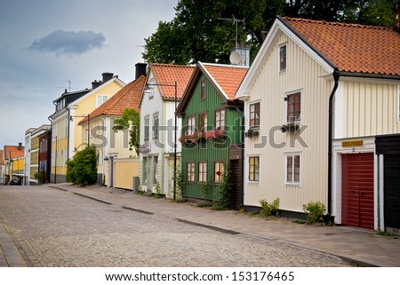 Street of cute houses in a town of northern Europe. Sweden