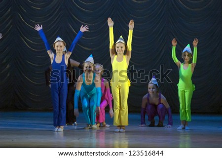 DNEPROPETROVSK, UKRAINE - DECEMBER 30: Unidentified girls, ages 8-11 years old, perform dance \