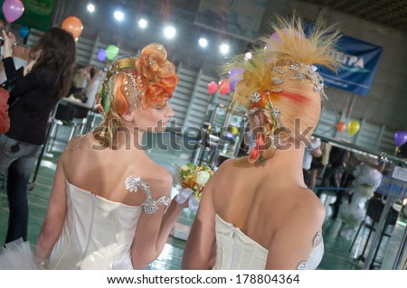 DNEPROPETROVSK, UKRAINE - MARCH 28: Models perform during the Championship on hairdressing, nail aesthetics and make YOUNG TALENTS OF UKRAINE on Mach 28, 2008 in Dnepropetrovsk, Ukraine