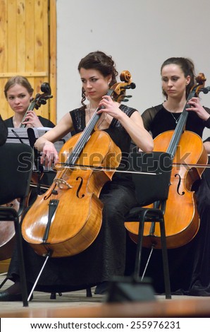 DNIPROPETROVSK, UKRAINE - FEBRUARY 23: Members of the Youth Symphony Orchestra FESTIVAL perform at the Conservatory on February 23, 2015 in Dnipropetrovsk, Ukraine