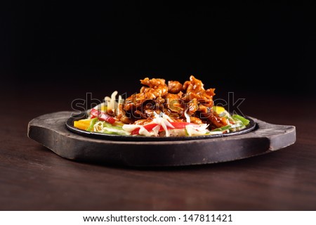 fresh tasty and colorful chinese food on wooden background