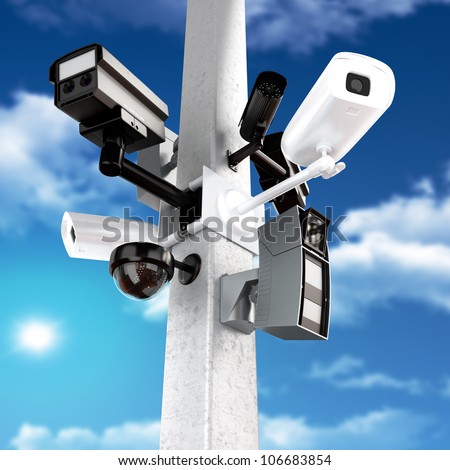 Surveillance mega camera\'s concept with a sky background